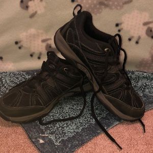 Pair of black shoes, great for hiking and more